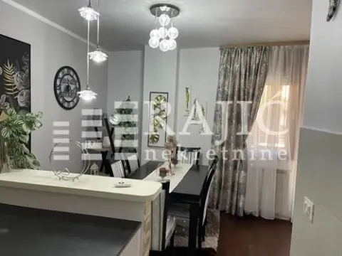Living room with dining area and modern lighting. - image 5