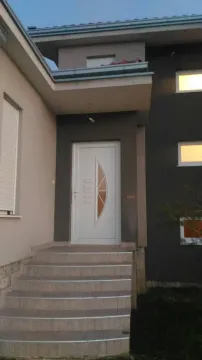Entrance door and stairs of a modern house. - image 5