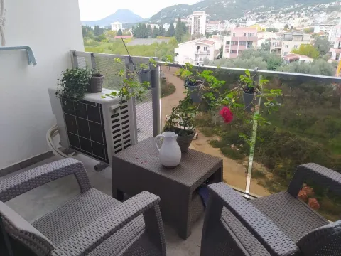 Furnished terrace with seating furniture and a view of the surroundings. - image 9