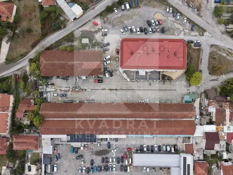 Aerial view of the buildings and surrounding courtyard. - image 3