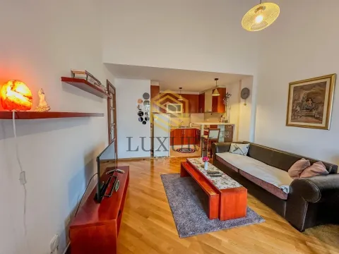 Living room with dining area and kitchen in the background. - image 3