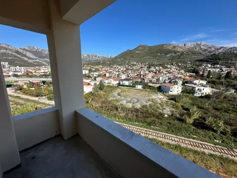View of the town and mountains from the balcony under construction. - image 8