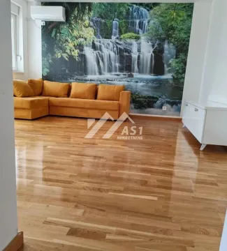 Dnevna soba sa ugaonom garniturom i foto-tapetom sa motivom vodopada. - image 2