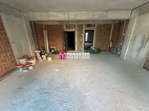 Unfinished space under construction with building materials. - image 4