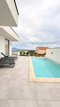 Terrace with a swimming pool and a sea view. - image 16