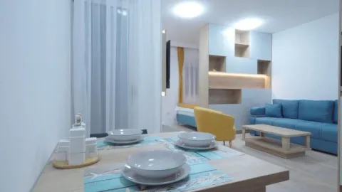 Living room with a dining table and seating furniture. - image 3