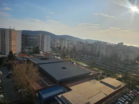 View of the cityscape and surrounding buildings from the property. - image 13