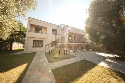 Exterior of the house with yard and paved paths. - image 20