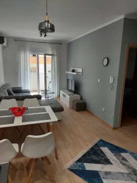 Living room with dining area and access to the terrace. - image 2