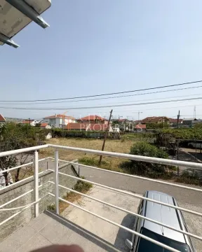 View from the terrace towards the surrounding neighborhood and yard. - image 4