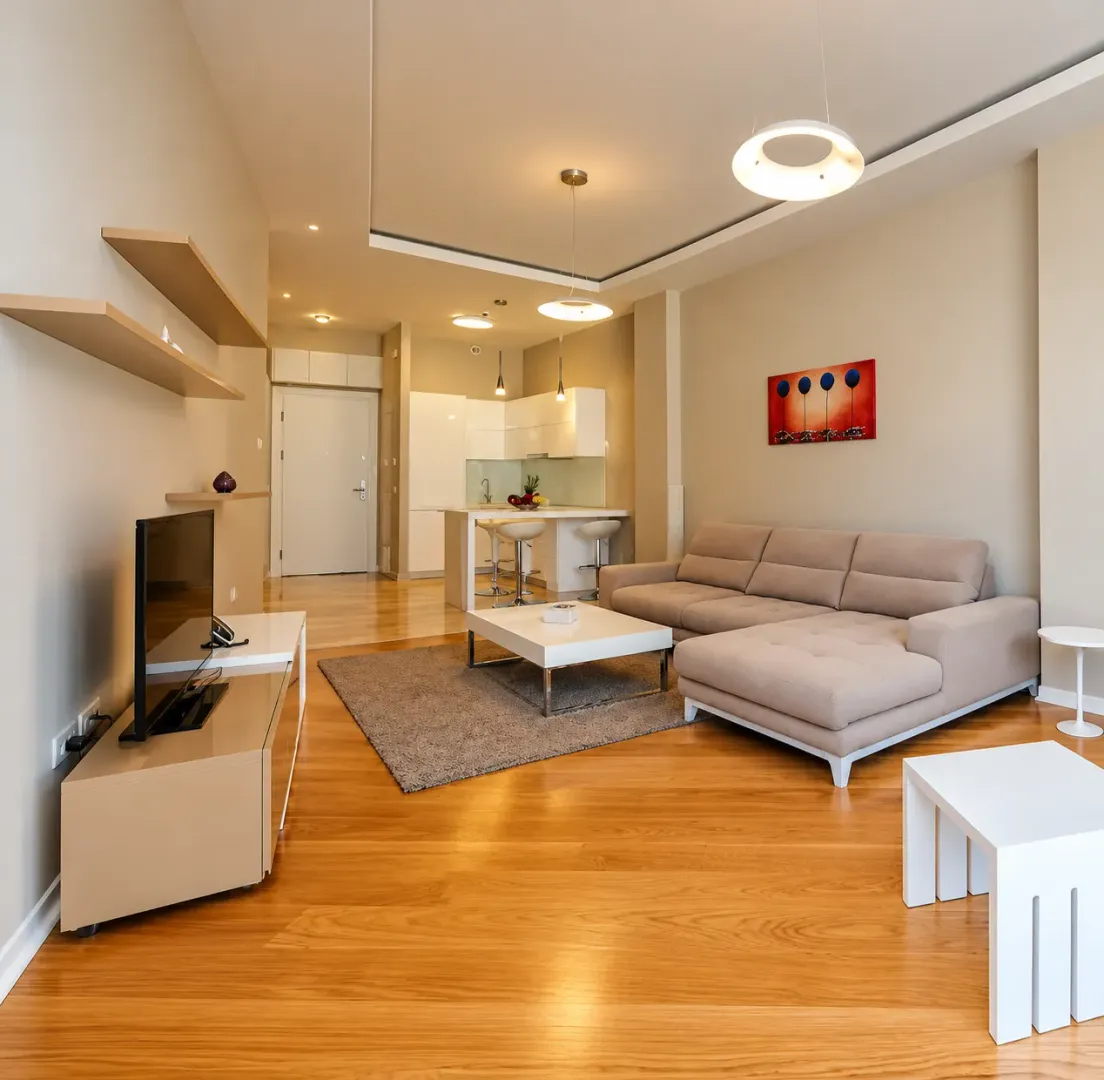 Spacious living room connected with the kitchen and dining area.