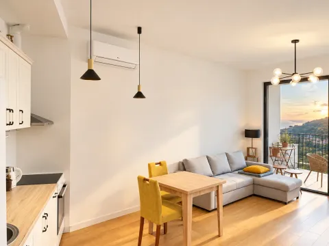 Modern living room with dining area and kitchen, with access to the terrace. - image 2