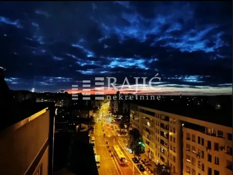 View of the city and street in the evening. - image 11