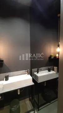 Modern sinks with faucets in the bathroom. - image 10