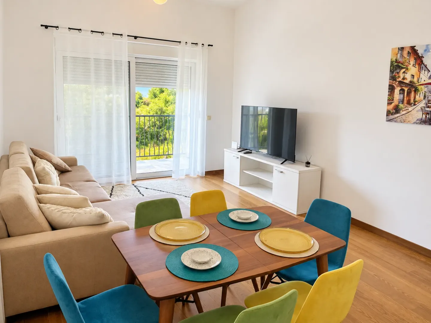 Living room with dining area and terrace access.