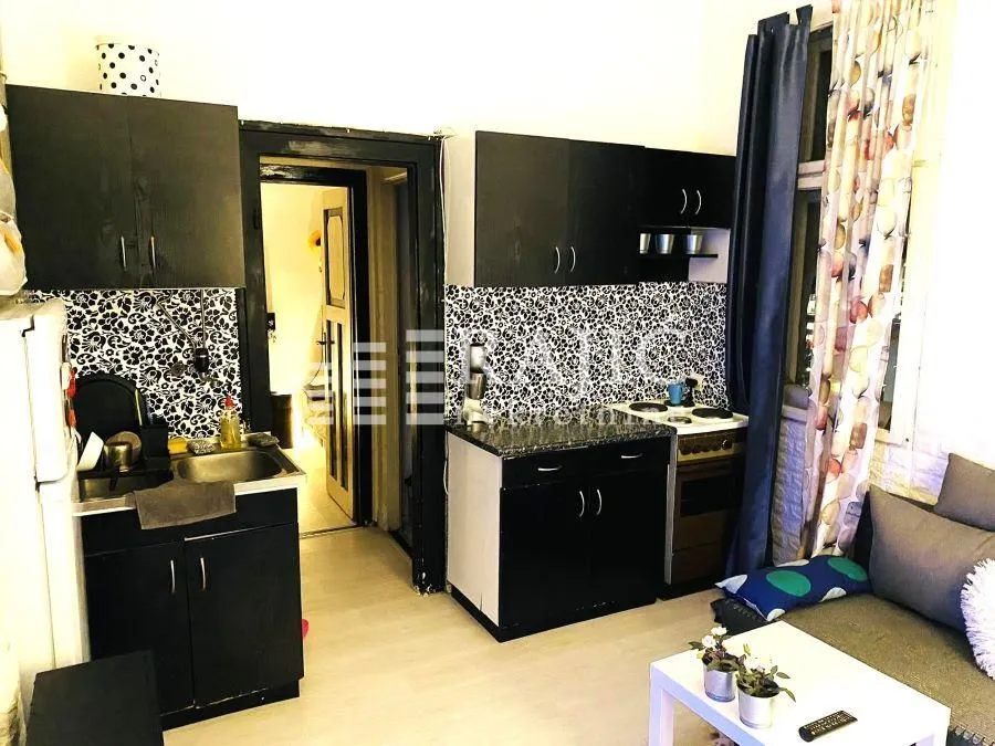 Smaller kitchen combined with the living room in the apartment.