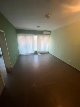 Empty room with dark floor tiles and window blinds. - image 4