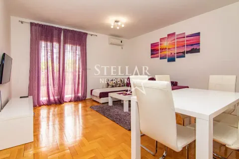 Living room with dining table and sofa set. - image 4