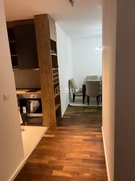 View from the hallway towards the kitchen and dining area. - image 6