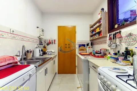 Small kitchen with cabinets and home appliances. - image 18