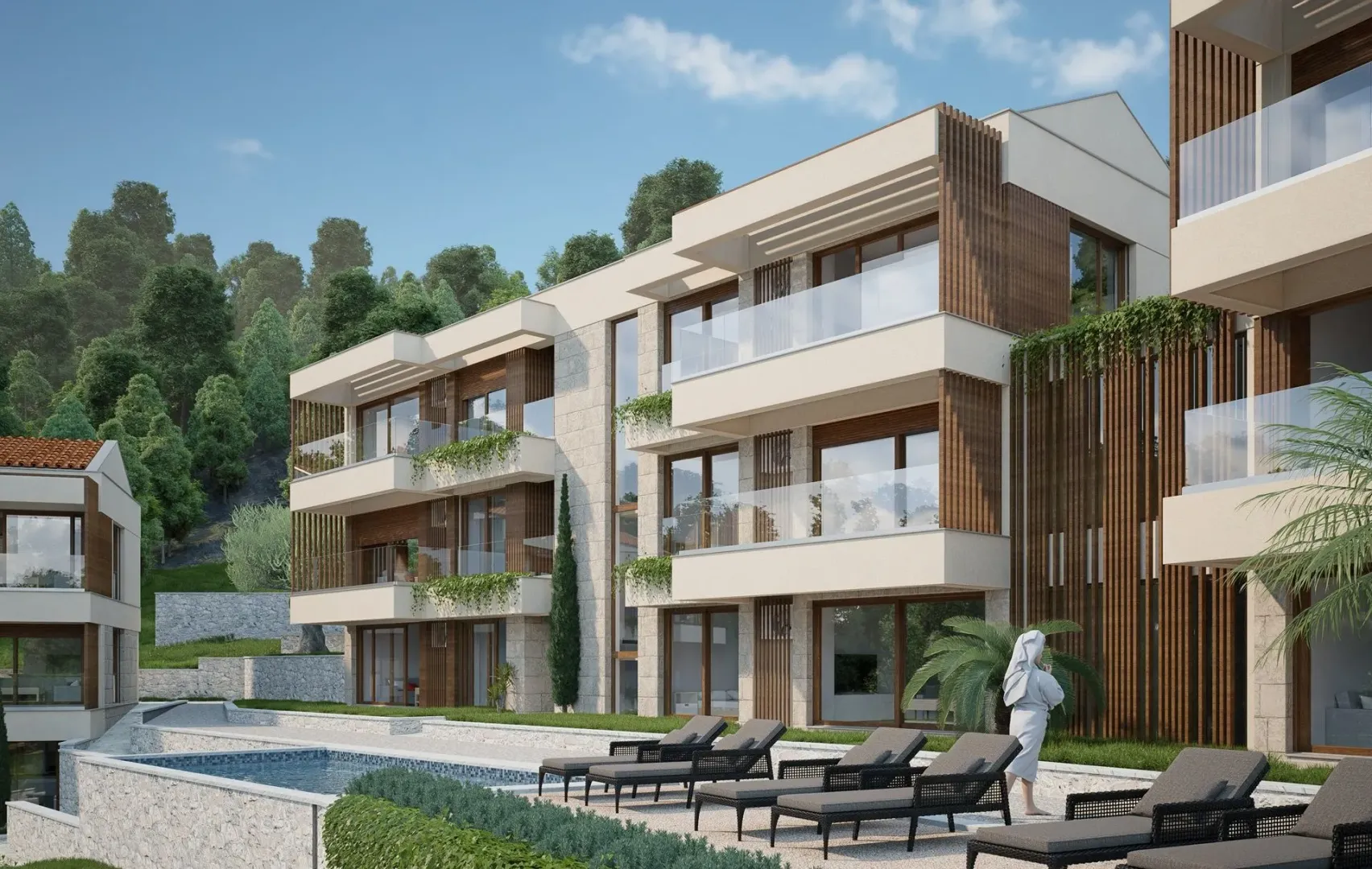 Spoljašnji izgled moderne stambene zgrade sa bazenom i ležaljkama.