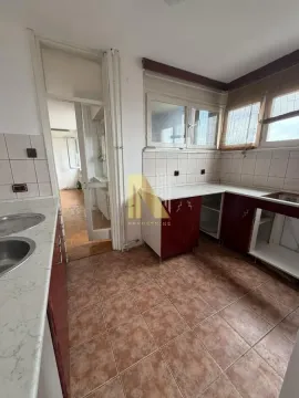 Older kitchen with tiles and wooden cabinets. - image 8