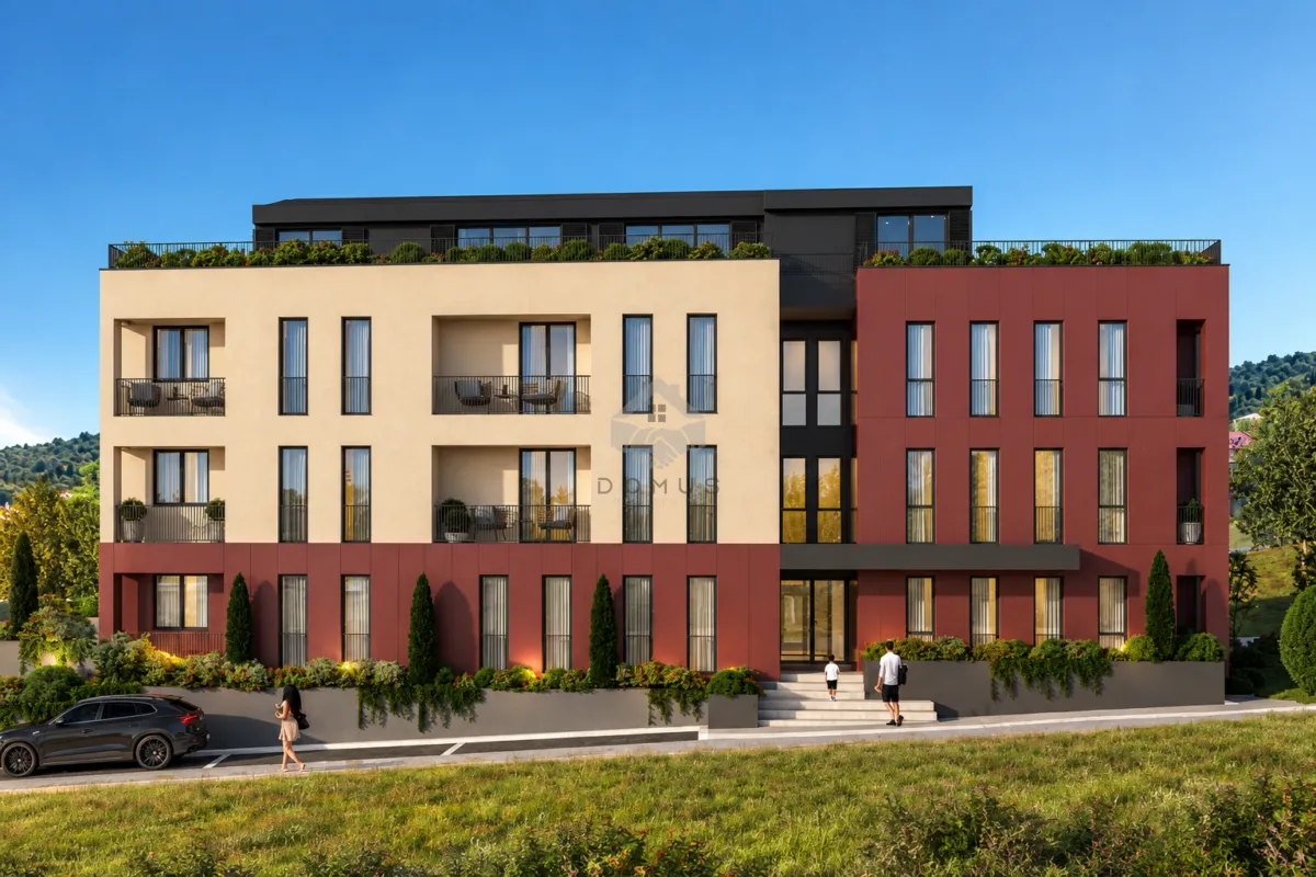 Exterior view of a modern residential building with a landscaped yard and terraces.