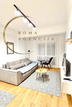 Dnevna soba sa garniturom, stočićem i TV komodom. - image 4