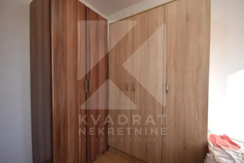 Bedroom with large wooden wardrobes. - image 6