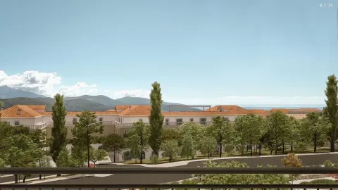 Pogled sa terase na stambeni kompleks okružen zelenilom. - image 6