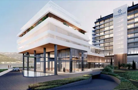 Spoljašnji izgled moderne poslovno-stambene zgrade sa uređenim prilazom i okolnim prostorom. - image 21