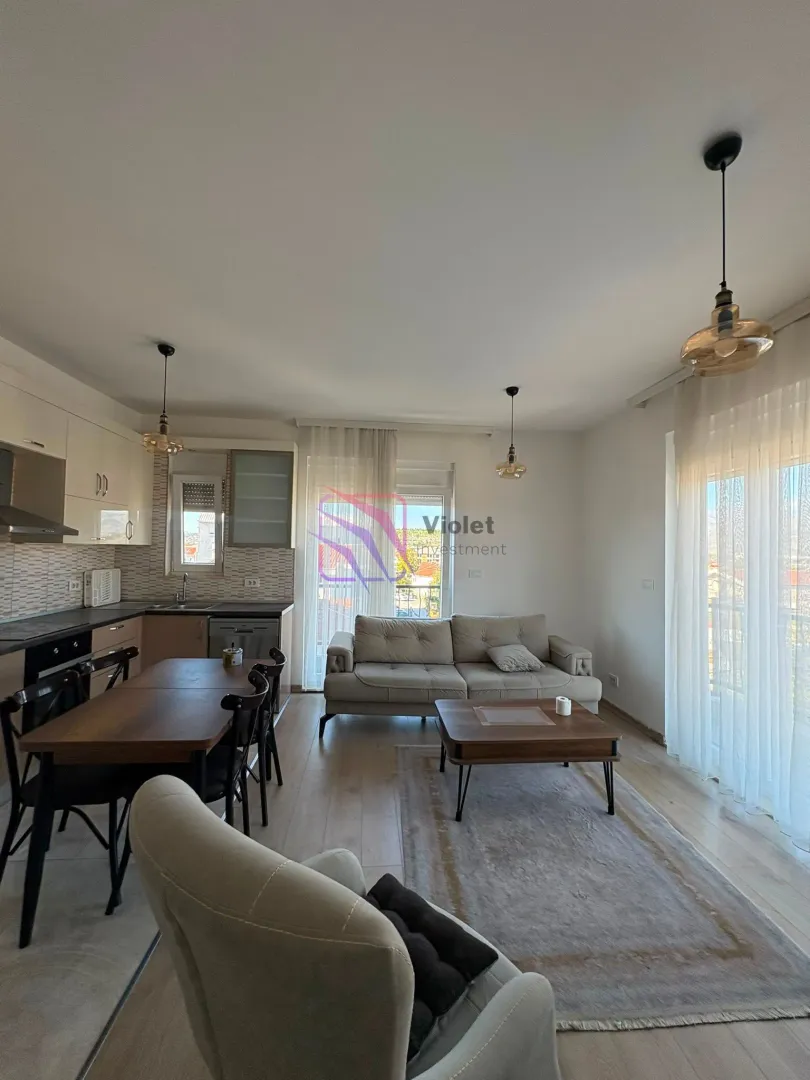 Spacious living room connected to the kitchen and dining area.