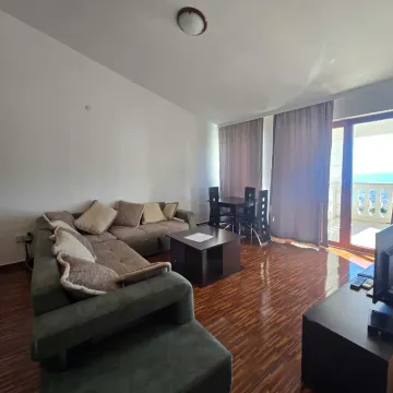 Living room with a sectional sofa, coffee table and dining table, with access to the terrace. - image 6
