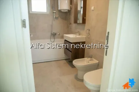 Bathroom equipped with a bathtub, washbasin, bidet, and toilet. - image 20