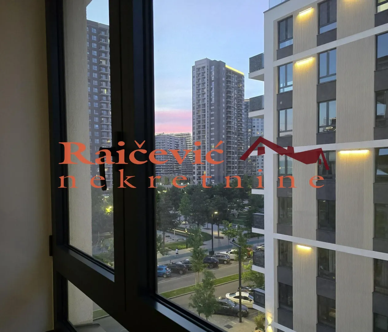 View through the window of surrounding buildings and neighborhood.