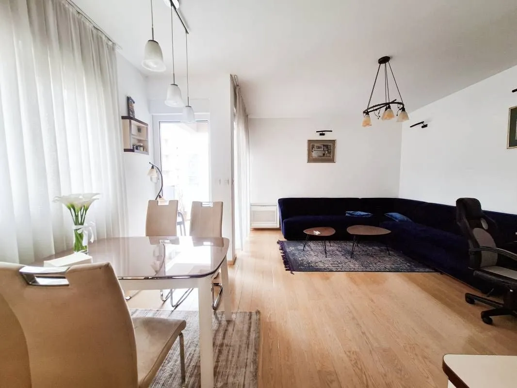Living room with a dining area and seating set.