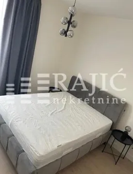 Bedroom with a double bed. - image 7
