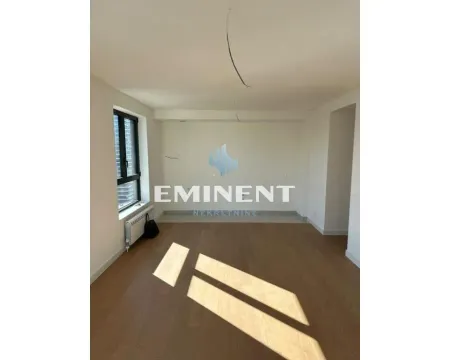 Empty room with parquet flooring and a window. - image 5