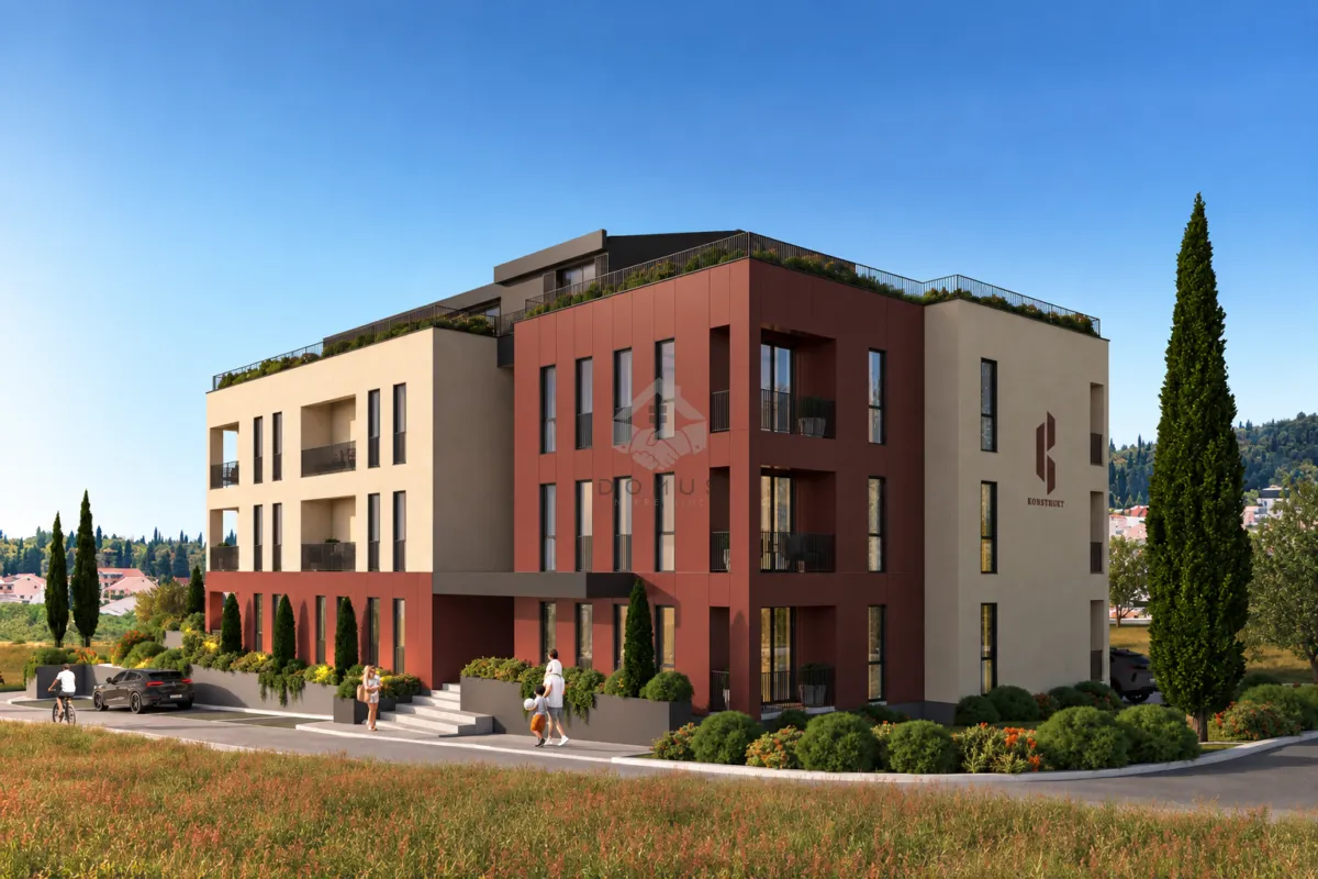 Exterior view of a modern residential building with landscaped yard.