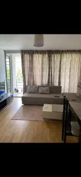 Living room with a sofa and access to the terrace. - image 7