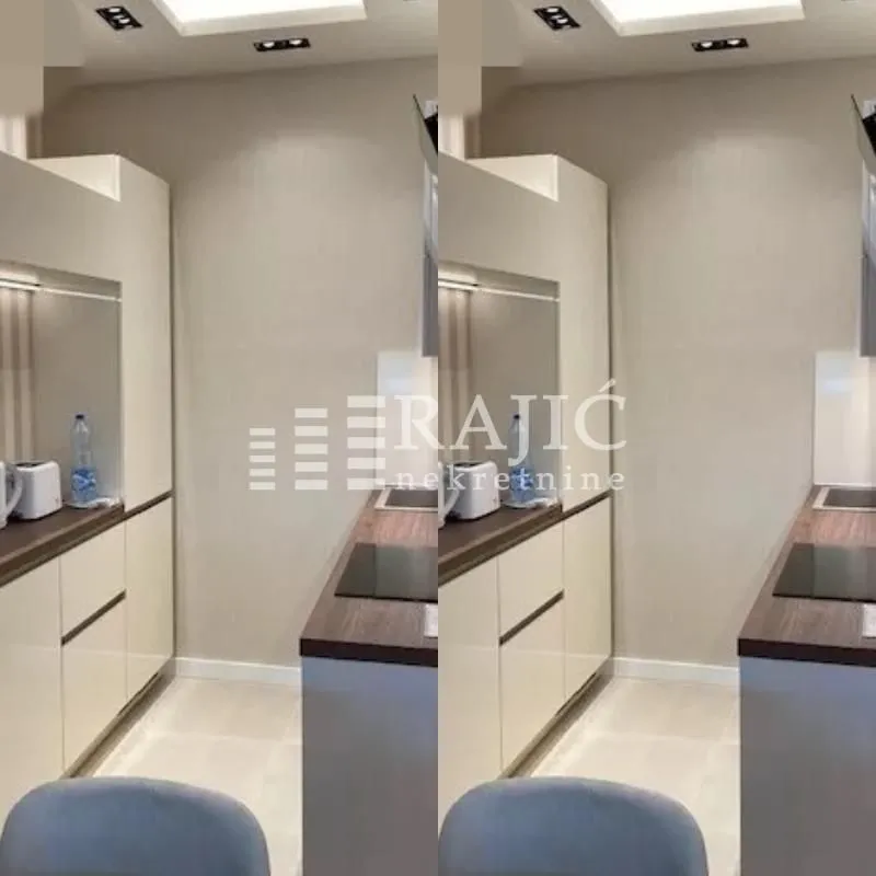 View of a part of the kitchen with modern style elements.