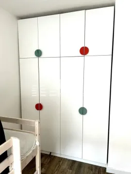 White built-in wardrobe in a children's bedroom. - image 7
