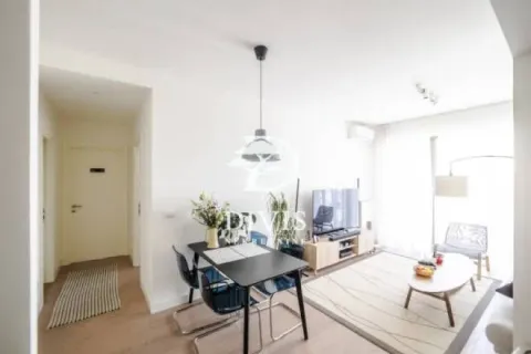 Living room with dining area and access to the terrace. - image 14