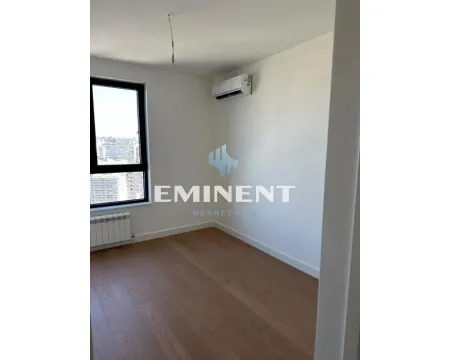 Empty room with parquet flooring, an air conditioning unit, and a window. - image 7