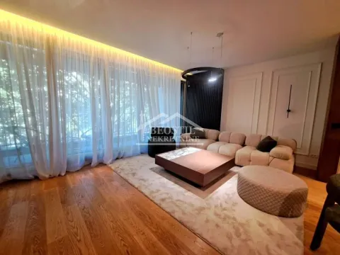Modern living room with a sofa and large windows with curtains. - image 6