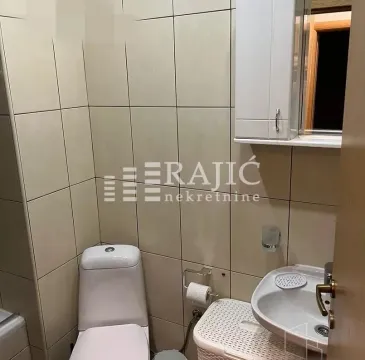 Small bathroom with sanitary ware and tiles. - image 13