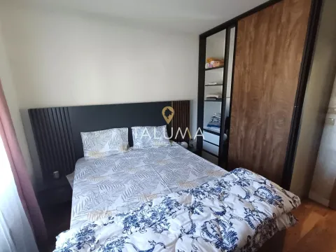 Bedroom with a double bed and a fitted wardrobe. - image 7