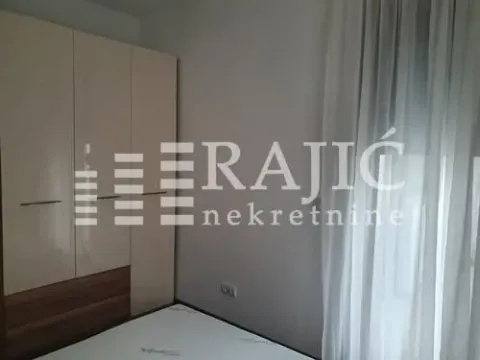 Bedroom with a fitted wardrobe and a double bed. - image 7