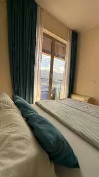 Comfortable bedroom with a double bed and a sea view. - image 3