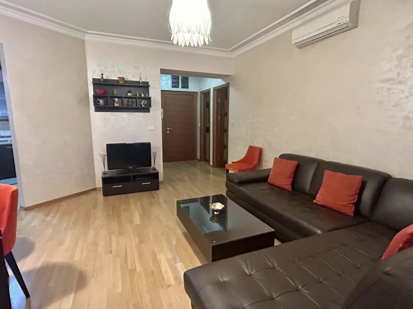 Living room with a leather sofa.